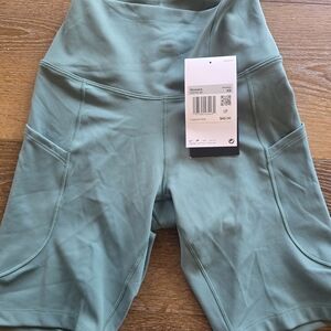 Nike Women’s High-Waist Bike Shorts in Sage Green